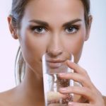 brunette-drinking-from-a-glass-of-water