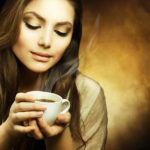 good_morning_woman_drinking_coffee_10_may_2011_dreamstimefree256333